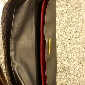 Black and pink Juicy Couture clutch